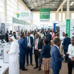 WHX Johannesburg 2026 Explained: Schedule, Exhibitors and Key Insights Healthcare professionals networking at an Africa healthcare expo exhibition floor with medical device displays
