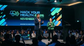 Speakers presenting on stage at Hack Your Health 2026 conference in November